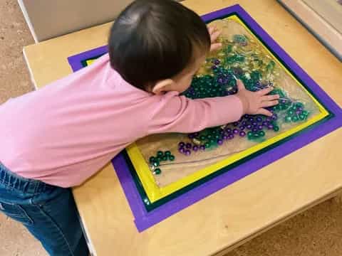 a child playing with a puzzle