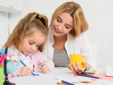 a person and a girl painting