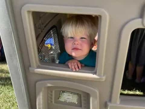 a child in a play structure