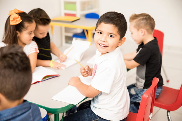 a group of children in a classroom