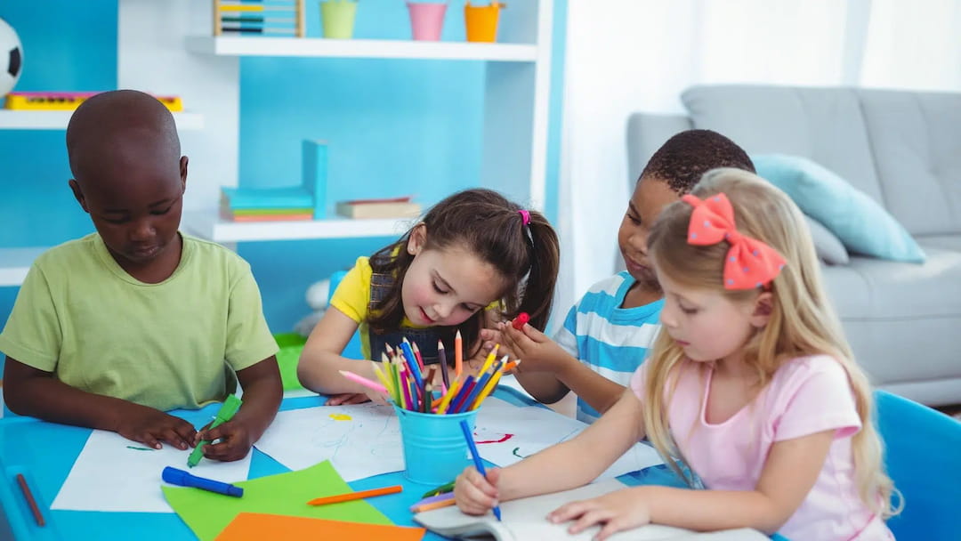 a group of children coloring