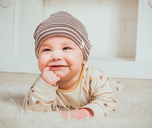 a baby wearing a hat