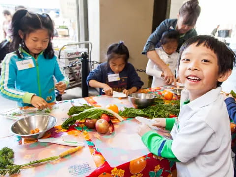 a group of children eating food