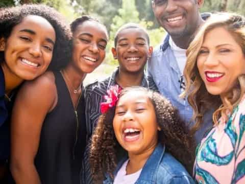 a group of people posing for a photo