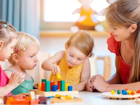 a group of children playing with toys