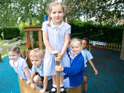 a group of kids posing for a photo