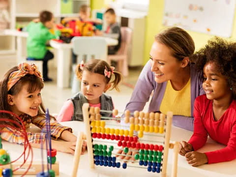 a person and a few children playing with toys