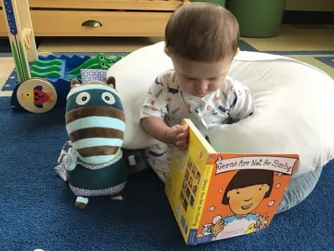 a baby playing with a toy