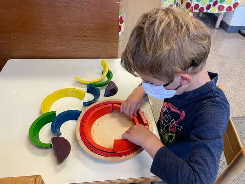 a child playing with a toy