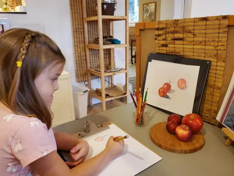 a young girl painting