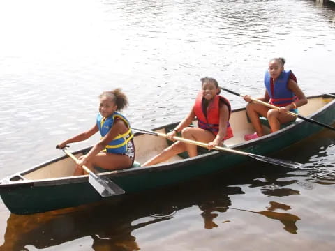 a group of people in a canoe