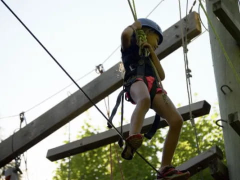 a person on a zip line