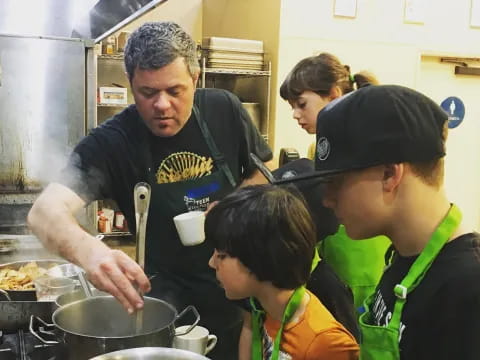 a group of people cooking