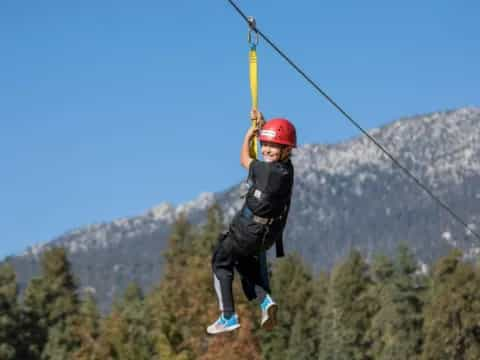 a person on a zip line