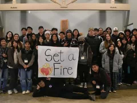 a group of people posing for a photo