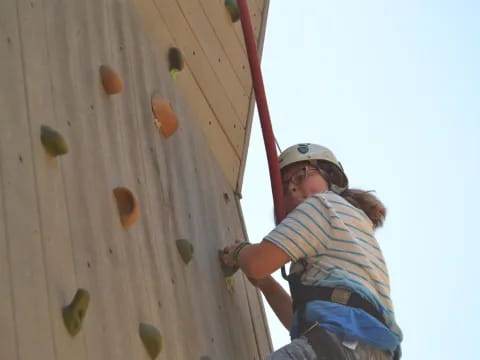 a person climbing a wall