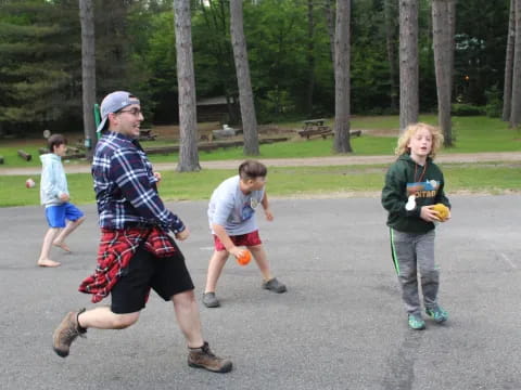 a group of kids playing in a park