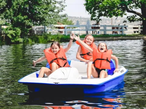 a group of kids on a raft