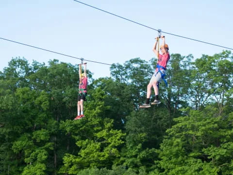 a couple of people on a cable