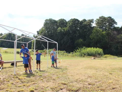 a group of people playing football