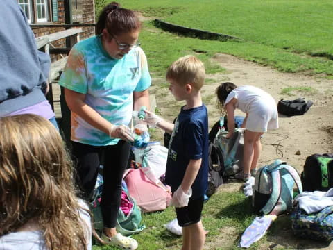 a person and a group of children