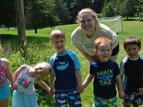 a group of children posing for a photo