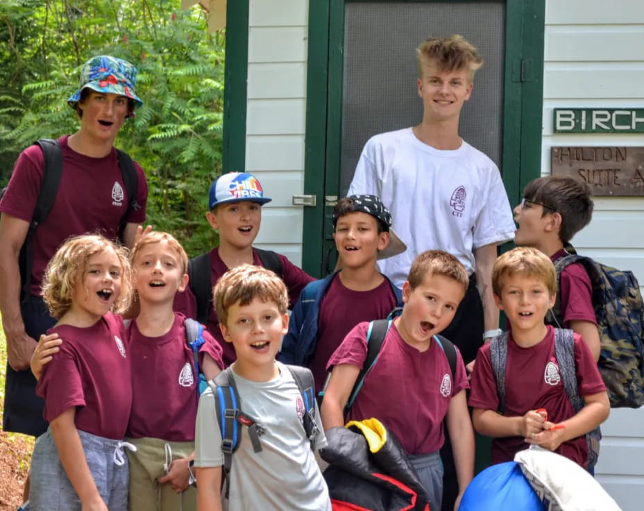 a group of kids posing for a photo