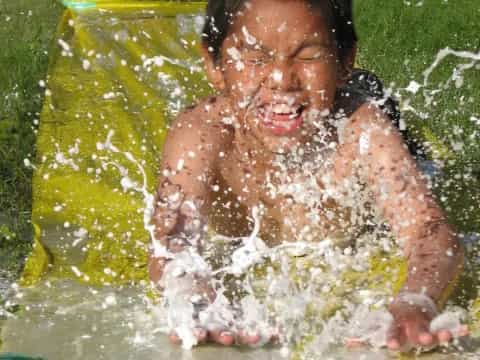 a boy in a pool