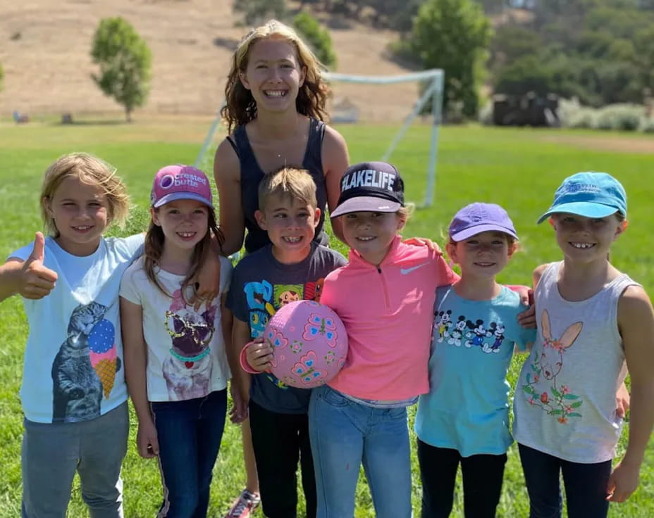 a group of children posing for a photo