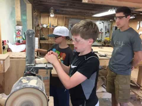 a group of men in a workshop