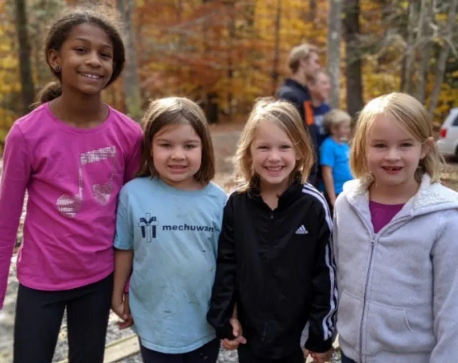 a group of children smiling