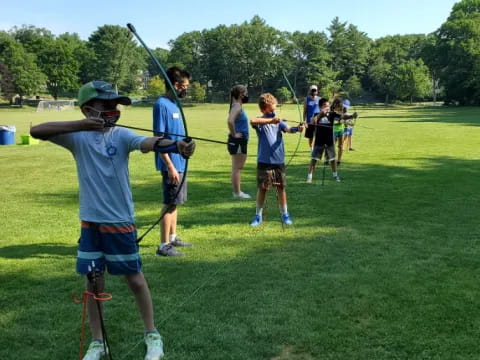 a group of people playing golf