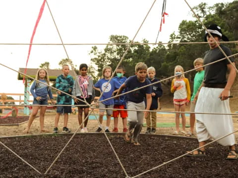 a group of people on a rope