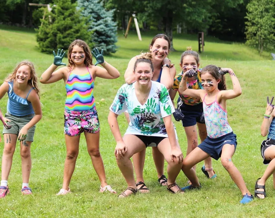 a group of girls posing for a picture