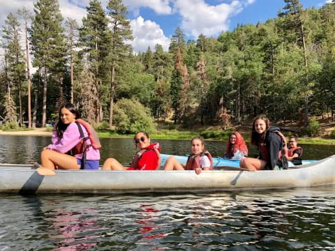 a group of people on a raft