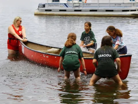 a group of people in a canoe