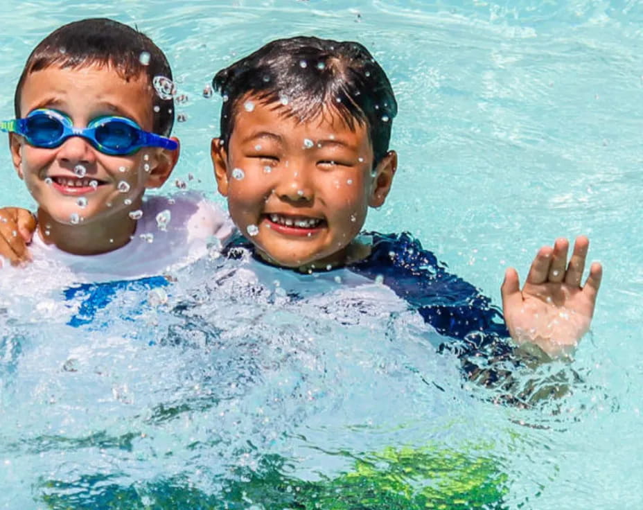 two boys in a pool