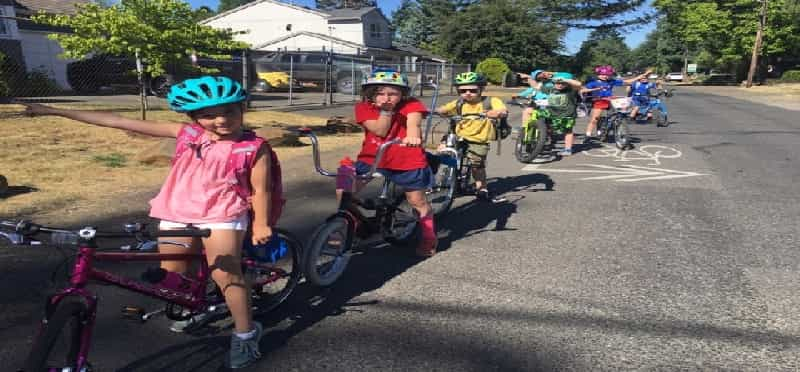 a group of kids on bikes