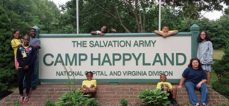 a group of people holding a banner