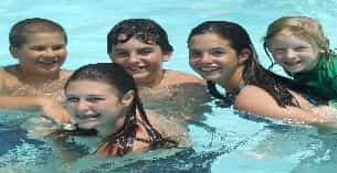 a group of people in a pool