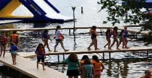 a group of people playing in the water