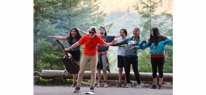 a group of people posing for a photo