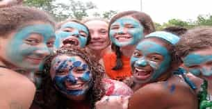 a group of people with face paint