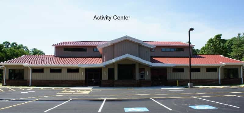 a large building with a parking lot