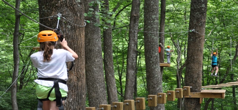 a person shooting a bow and arrow