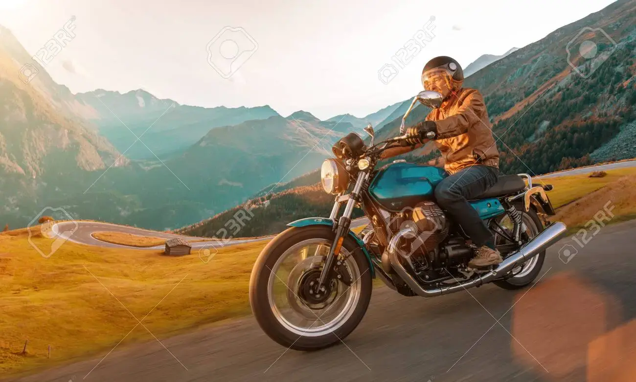 a man riding a motorcycle