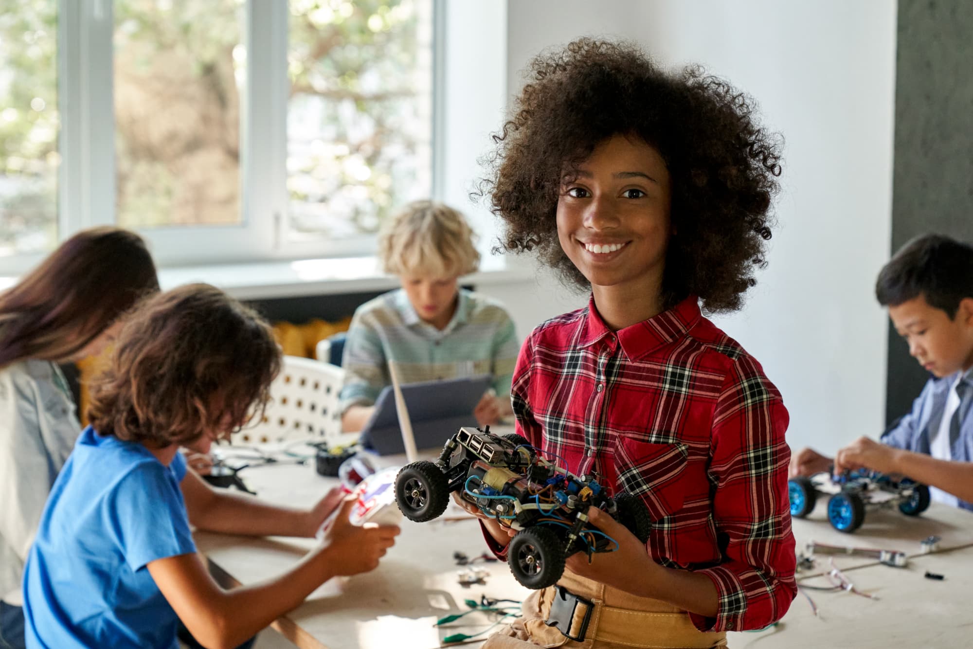 a group of children playing with toys