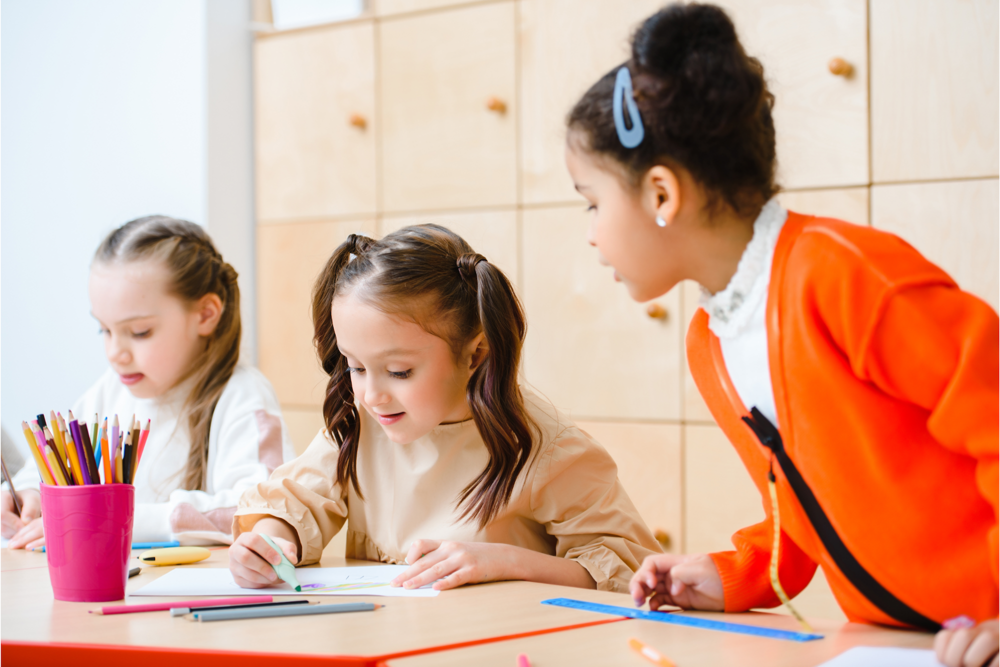 a few young girls studying