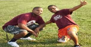 two boys lying on the grass