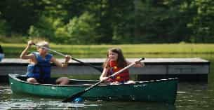 two girls in a canoe